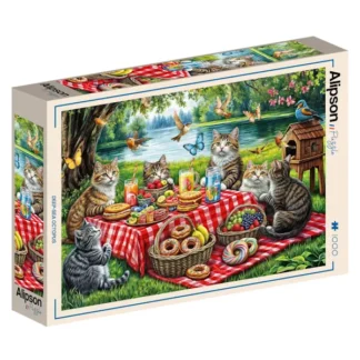 Kissat picnicillä.